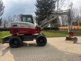 2020 Takeuchi TB295W wheel excavator, side view