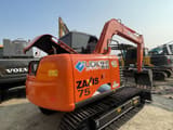 2023 Hitachi Zaxis 75 crawler excavator, rear three-quarter view