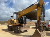 2016 Caterpillar M320F wheel excavator side view