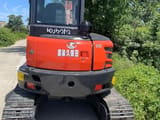 Kubota KX163 mini excavator, rear view