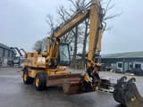 2000 CASE 788 wheel excavator, front three-quarter view