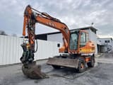2012 Volvo EW140D wheel excavator, side profile view