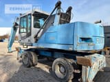 2007 Fuchs MHL320 material handler, rear three-quarter view
