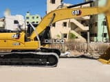 2026 Caterpillar 323D3 crawler excavator, side view