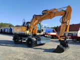 2014 Hyundai R140W-9 wheel excavator, side profile view