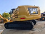 2019 Caterpillar 336 crawler excavator rear three-quarter view