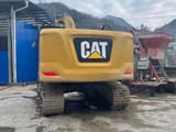 2023 Caterpillar 320GC crawler excavator, rear view