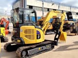 Komatsu PC55MR-2 mini excavator, rear three-quarter view