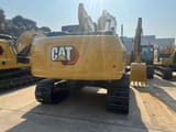 2026 Caterpillar 323GX crawler excavator rear view