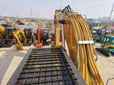 2020 Caterpillar 329D crawler excavator, high-angle view of boom and deck