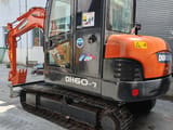 Doosan DH60-7 mini excavator, rear three-quarter view
