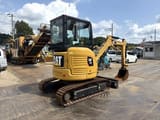 2014 Caterpillar 303E mini excavator, rear three-quarter view
