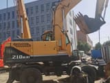 2016 Hyundai 210W-9T wheel excavator side view