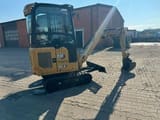 2022 Caterpillar 301.6 mini excavator, rear three-quarter view