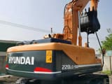 2023 Hyundai R220LC-9S crawler excavator, rear three-quarter view