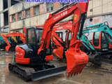 2024 Kubota KX155-5 Ai mini excavator, front three-quarter view