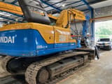 2011 Hyundai R180LC-9 crawler excavator, rear three-quarter view
