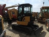2023 Komatsu PC35MR mini excavator, three-quarter view