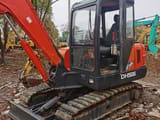 Doosan DH55 crawler excavator, side view