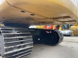 2022 Caterpillar 320GC crawler excavator undercarriage view