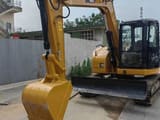 2019 Caterpillar 308DCR mini excavator, front three-quarter view