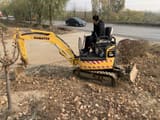 2016 Komatsu PC18MR crawler excavator, side view