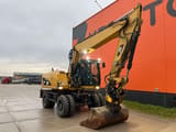 2011 Caterpillar M316D wheel excavator, side view