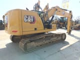 2020 Caterpillar 323 crawler excavator, rear three-quarter view