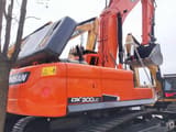 2022 Doosan DX300LC crawler excavator, rear three-quarter view