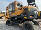 2022 Hyundai 150W-9S wheel excavator, rear three-quarter view
