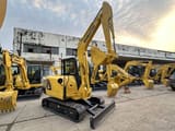 2022 Komatsu PC56-7 mini excavator, front three-quarter view