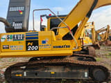 2016 Komatsu PC200 crawler excavator side view
