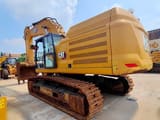 2022 Caterpillar 352 crawler excavator, rear three-quarter view