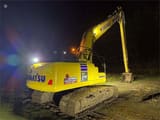 2025 Komatsu PC210LC-11 crawler excavator, rear three-quarter view