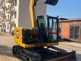 2025 Caterpillar 307.5 mini excavator, front three-quarter view