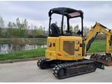 2023 Caterpillar 302.7 crawler excavator, rear three-quarter view