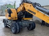 2021 Liebherr A914 COMPACT wheel excavator, rear three-quarter view