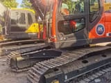 2022 Doosan DX225 crawler excavator, side profile view