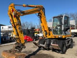 2012 New Holland MH 2.6 wheel excavator, side view