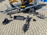 Berger Kraus BK1300JSR mini excavator on trailer with attachments