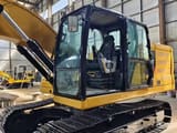 2023 Caterpillar 320GC crawler excavator, side view of cab and tracks