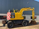 2019 Komatsu PW148-11 wheel excavator, rear three-quarter view
