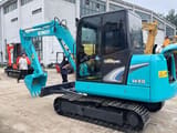 2024 Kobelco SK60 mini excavator, side view
