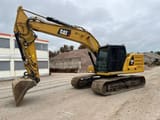 2018 Caterpillar 323-07A crawler excavator, side profile view