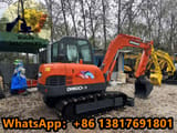 2023 Doosan DH60-7 mini excavator, rear three-quarter view