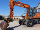 Doosan DX140W wheel excavator, side view