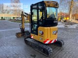 2022 Caterpillar 302 mini excavator, rear three-quarter view