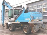 2016 Fuchs MHL335 E material handler, rear three-quarter view