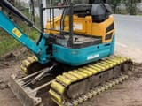 2024 Kubota U15 mini excavator, rear three-quarter view