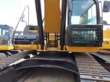 2023 Caterpillar 330D crawler excavator, front view of cab and boom